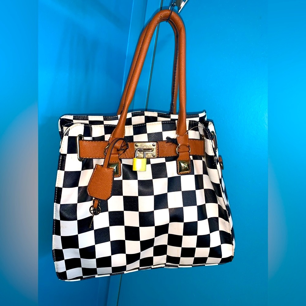 Michael Kors Checkered Black and White Purse with damaged handles and padlock